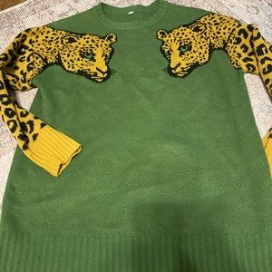 Leopard arm sweater. XL. Drop shoulder. See pics for measurements. 27x24 inches.